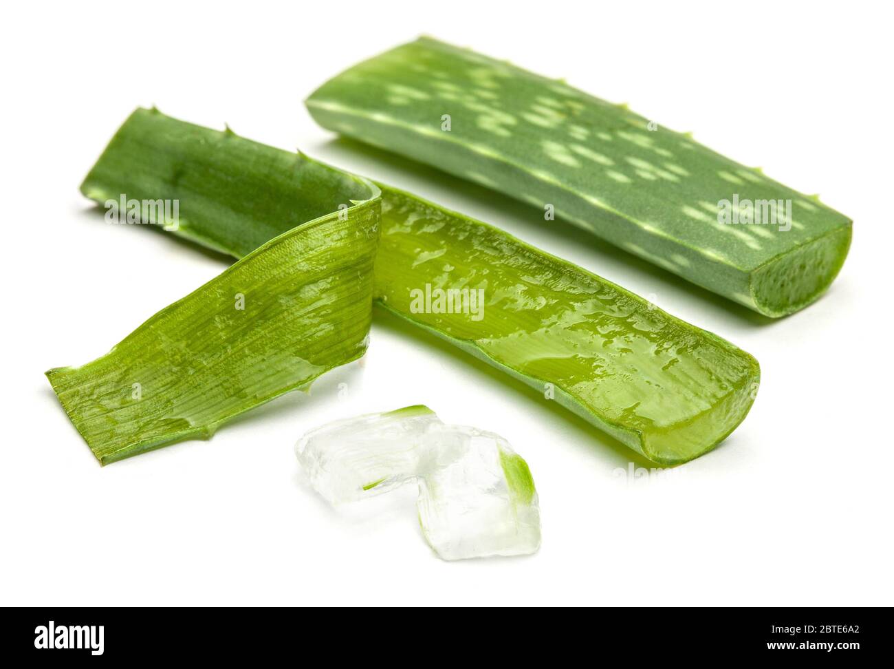 Aloe vera pieces of leaf and pulp isolated on a white background Stock  Photo - Alamy