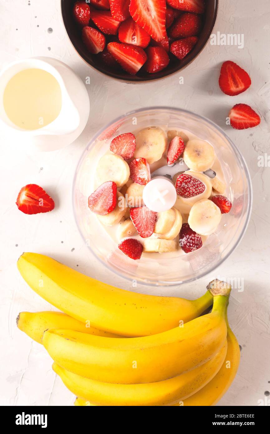 Healthy banana, strawberry and milk smoothie blender breakfast Stock ...