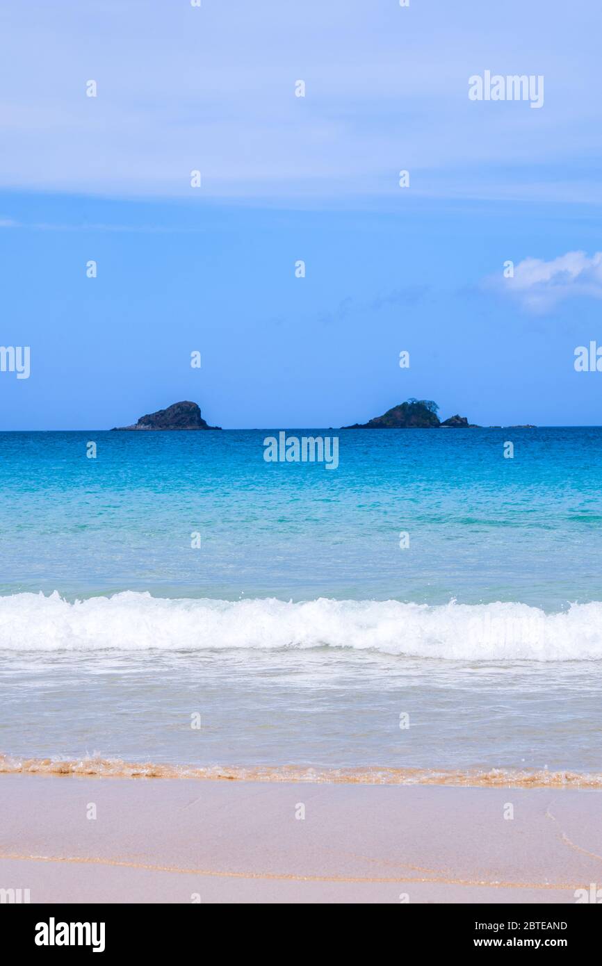 Beautiful amazing gold colored sandy beach with soft waves isolated ...