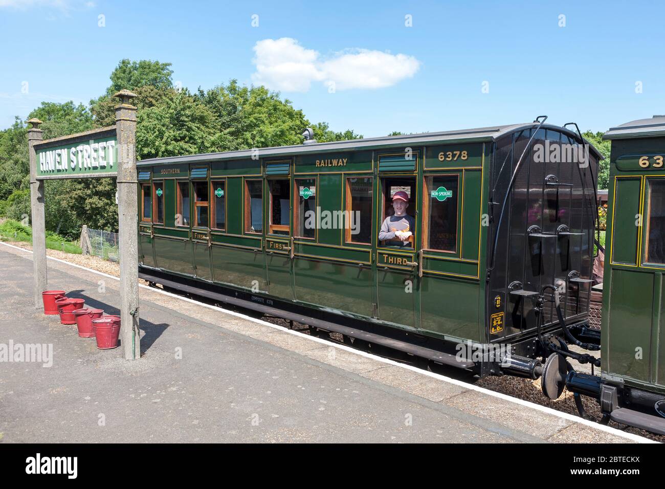 Vintage carriages wait at the platform at Haven Street on the Isle of Wight Steam Railway, Isle of Wight, UK.  Four-wheeled carriage 6378 is a 4-compa Stock Photo
