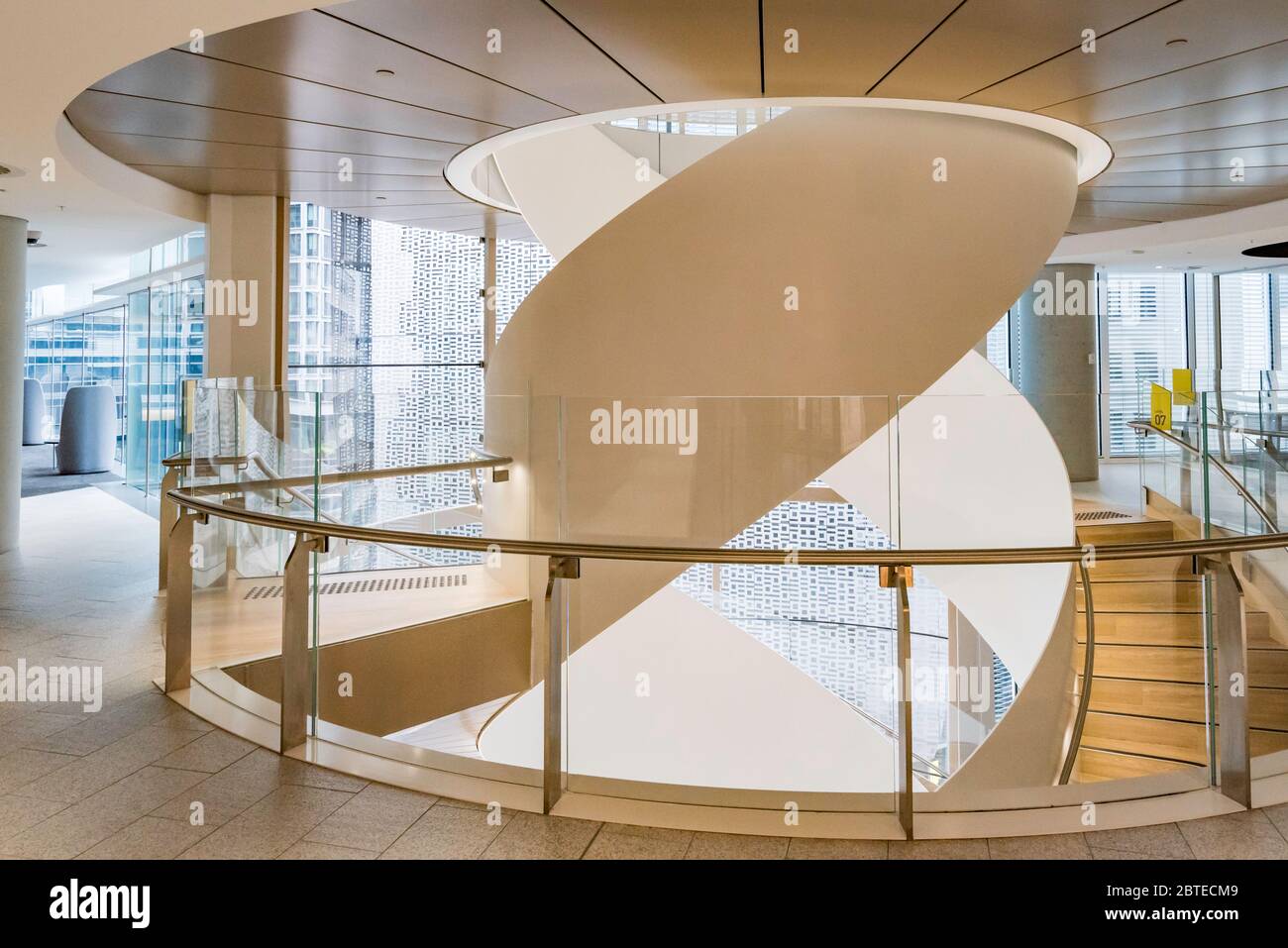 The intertwining double helix staircase in the new UTS Central university building in Sydney is made from Australian steel and curved glass Stock Photo