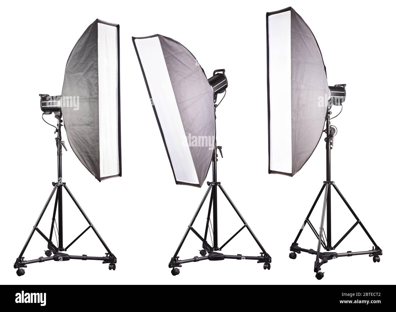 Studio lighting stands with flash and softbox isolated on the white