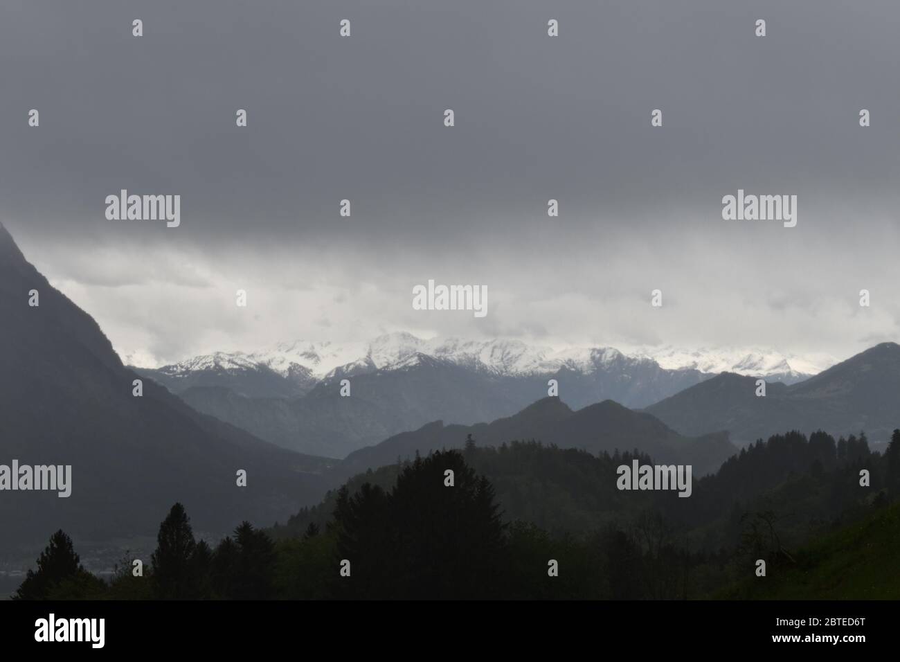 Swiss mountains on a dark rainy day Stock Photo