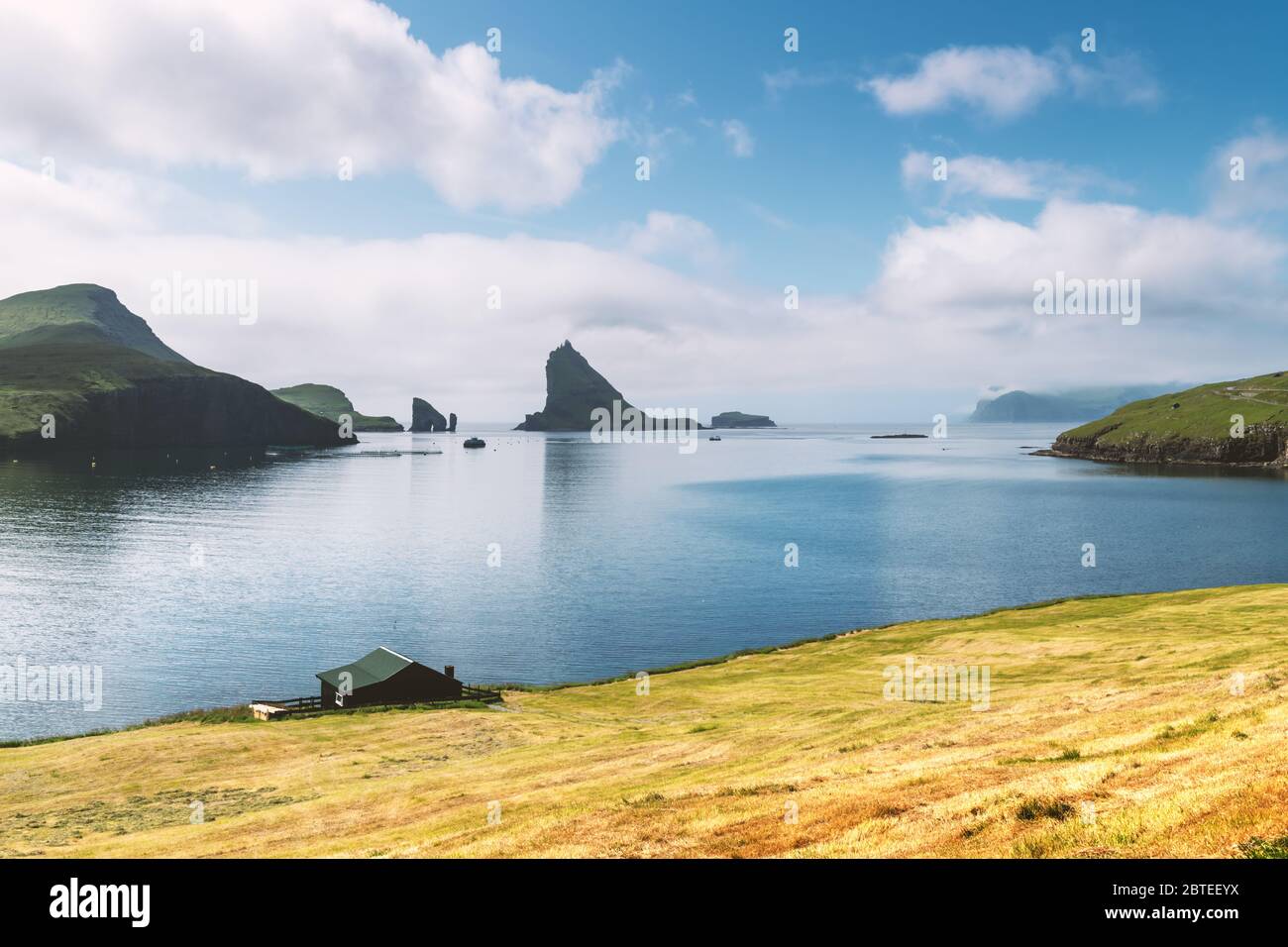 Breathtaking view on Drangarnir and Tindholmur sea stacks in Atlantic ocean, Faroe Islands. Landscape photography Stock Photo