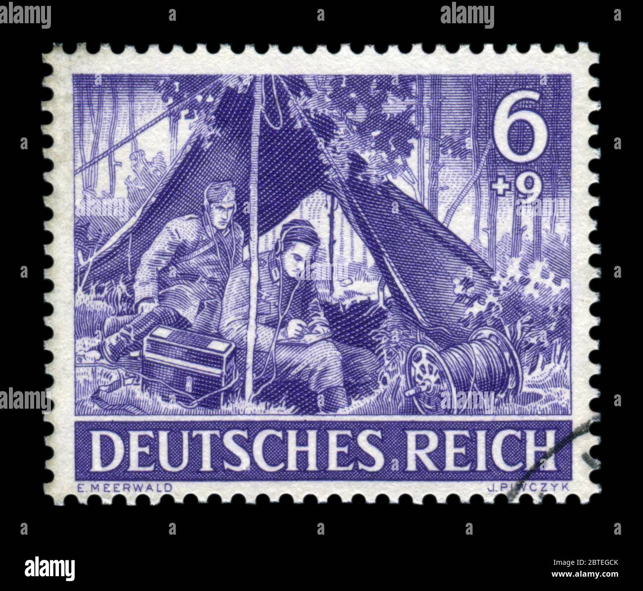 German historical stamp: Military Communicator, receives and transmits the order on the radio. The signal corps of the Wehrmacht, memorial day 1943 Stock Photo