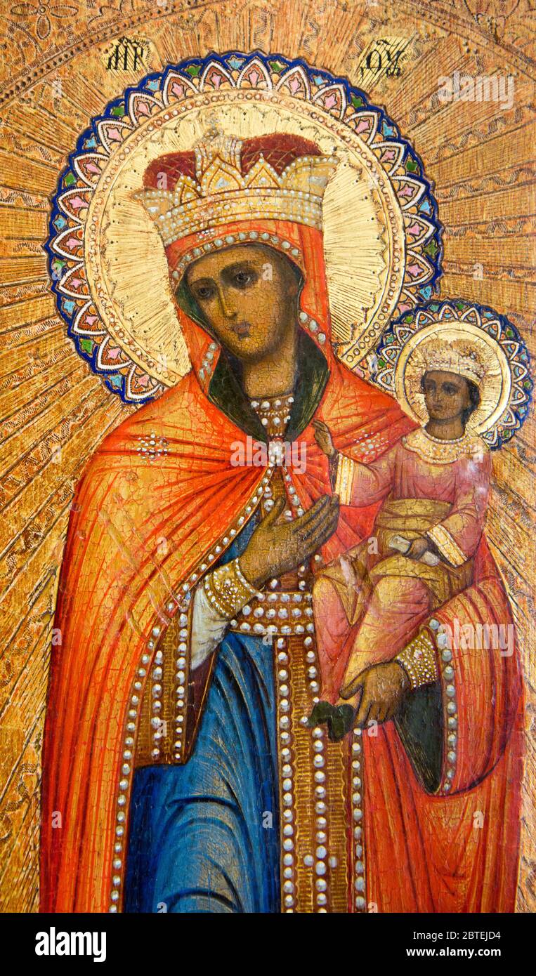 Byzantine icon from Ukraine called 'Comforter of the Afflicted' depicting Holy Mary Mother of God pointing to her Baby Jesus Christ with her hand. Stock Photo