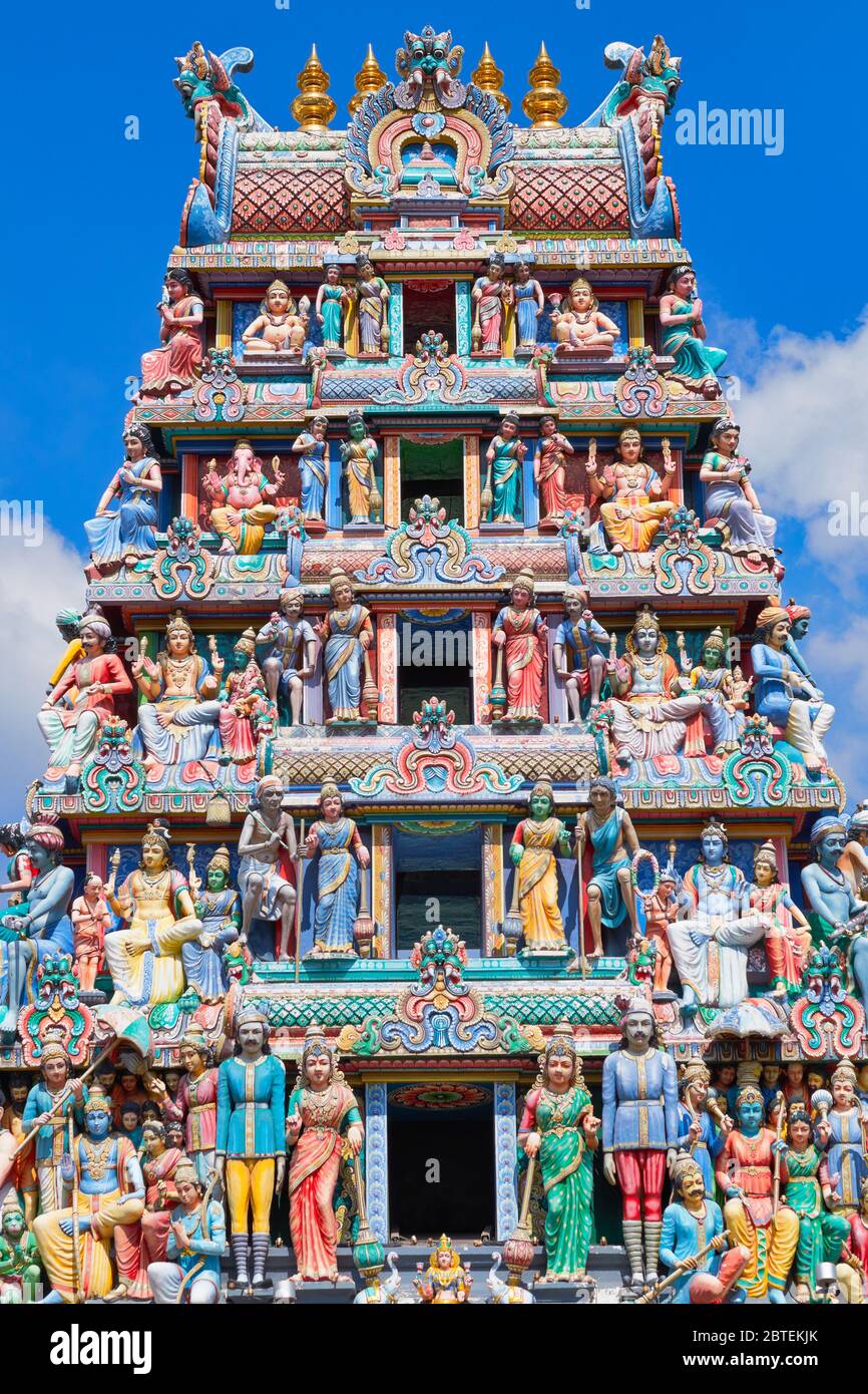 The gopuram (temple entrance tower) of Sri Mariammam Temple, South Bridge Road, Chinatown, Singapore, decorated with numerous figures of Hindu deities Stock Photo