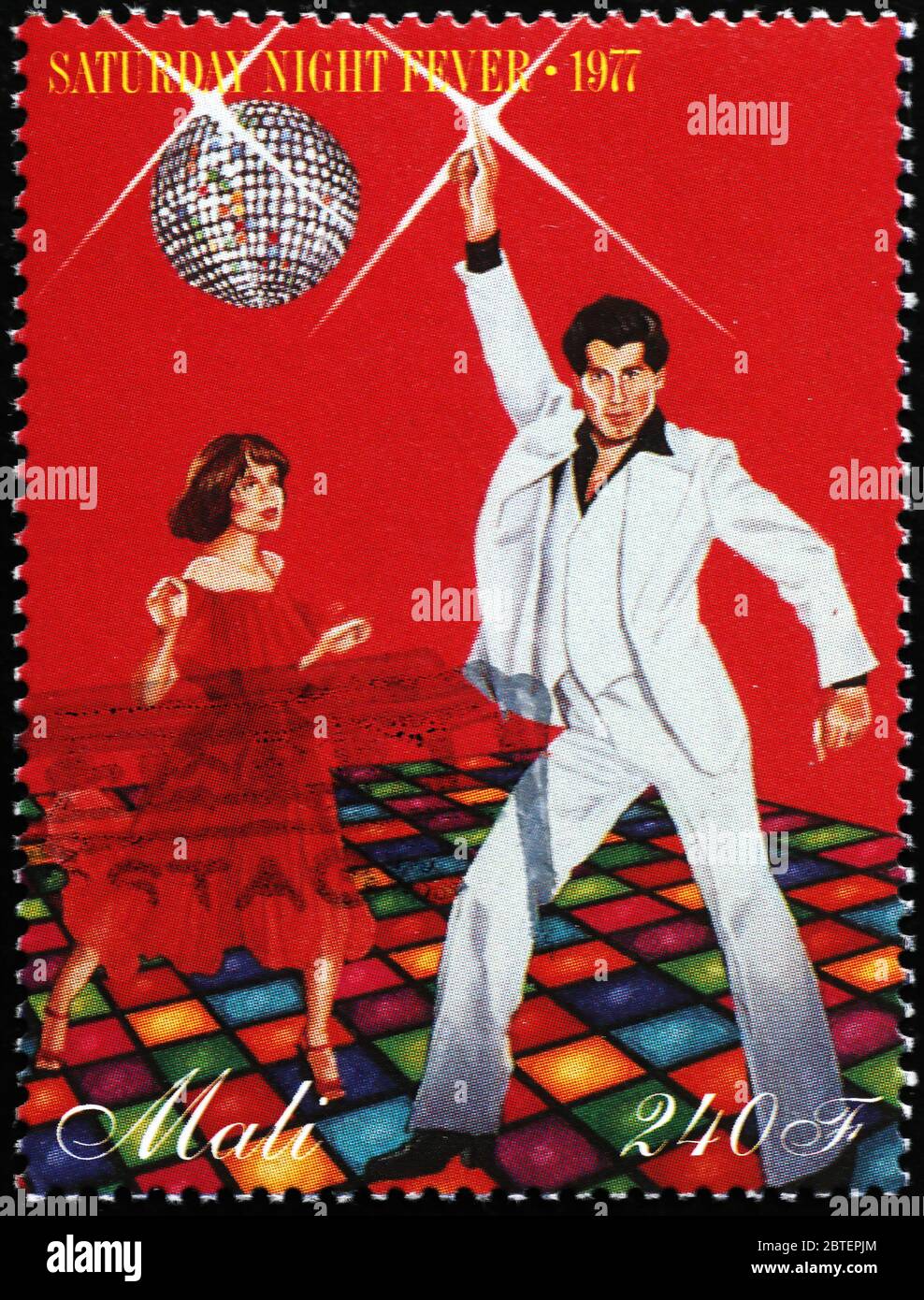 John Travolta in Saturday night fever on stamp Stock Photo