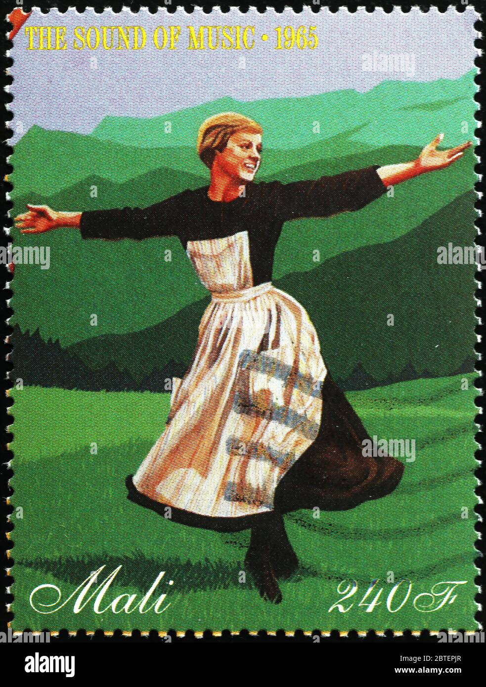 Julie Andrews in the sound of music on stamp Stock Photo