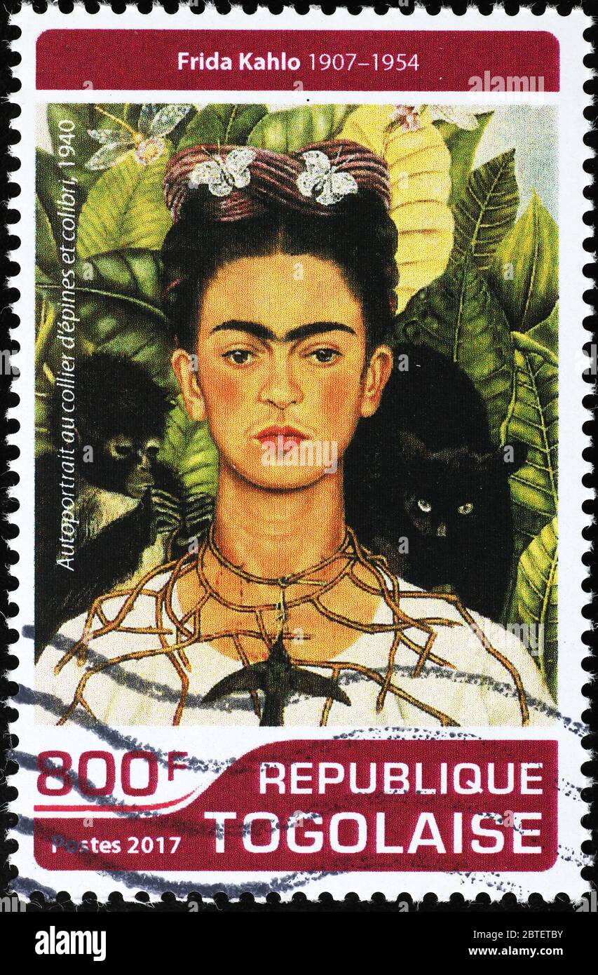Self-portrait with animals by Frida Kahlo on stamp Stock Photo - Alamy