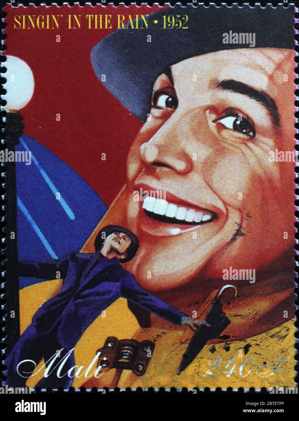 Vincent Minnelli in SInging in the rain on stamp Stock Photo