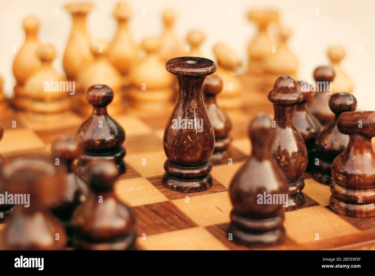 A Beautiful Brown Wooden Chess Board With king In Focus. Stock Photo