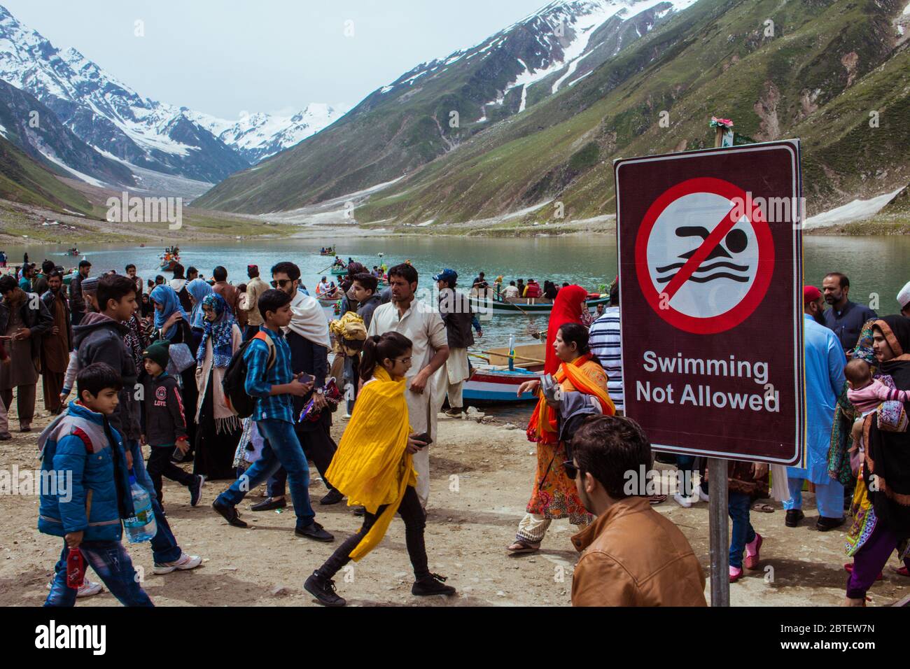 Swimming Not Allowed Waning Sign at Lake Saif ul Maluk, Naran Valley, Khyber Pakhtunkhua, Pakistan 6/26/2018 Stock Photo