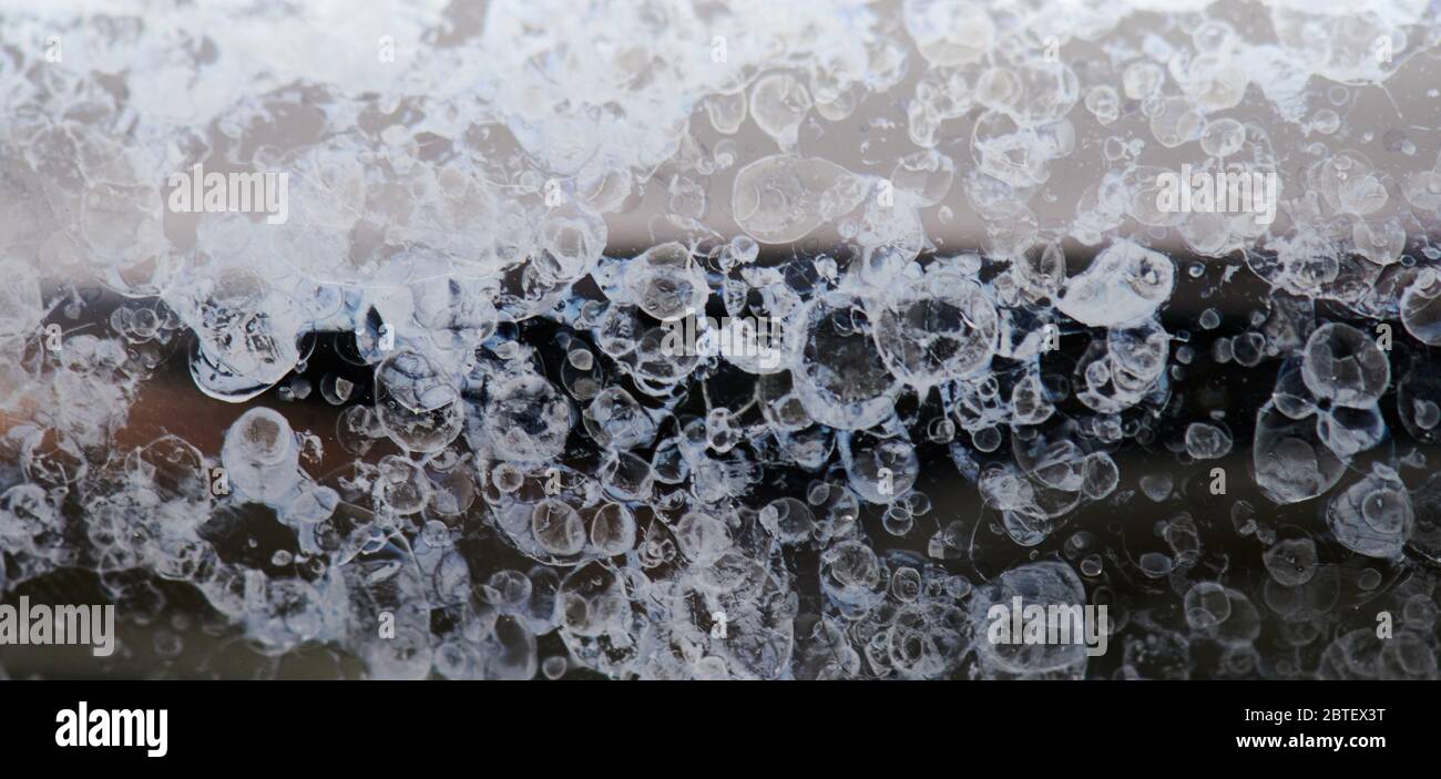 Stainless steel surface with water marks close up view Stock Photo Alamy