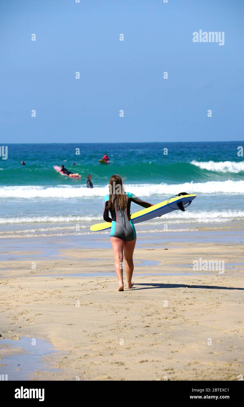 Surfing on Porthmeor beach. Stock Photo