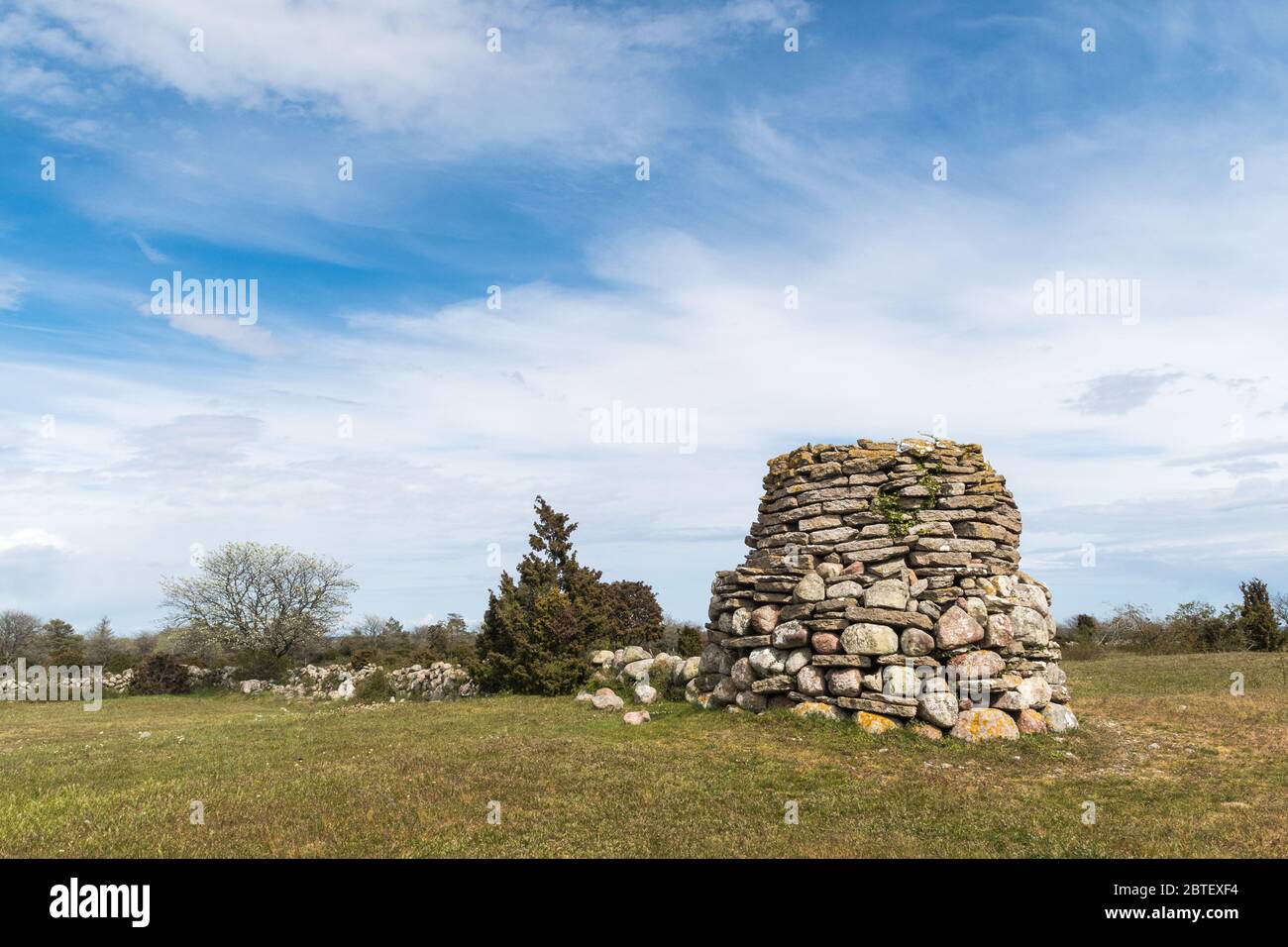 Old beacon in a landscape by Hogenas on the swedish island Oland Stock Photo