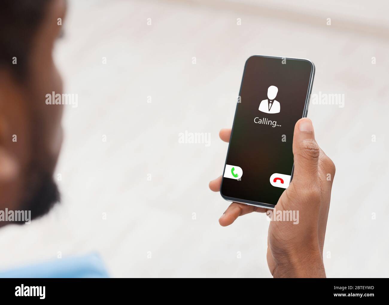 Male Hand Holding Phone With Incoming Call Stock Photo - Alamy