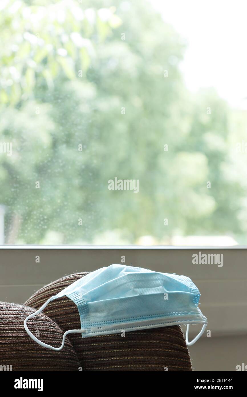 Prevention of coronavirus surgical medical masks. Safe at home. Stock Photo