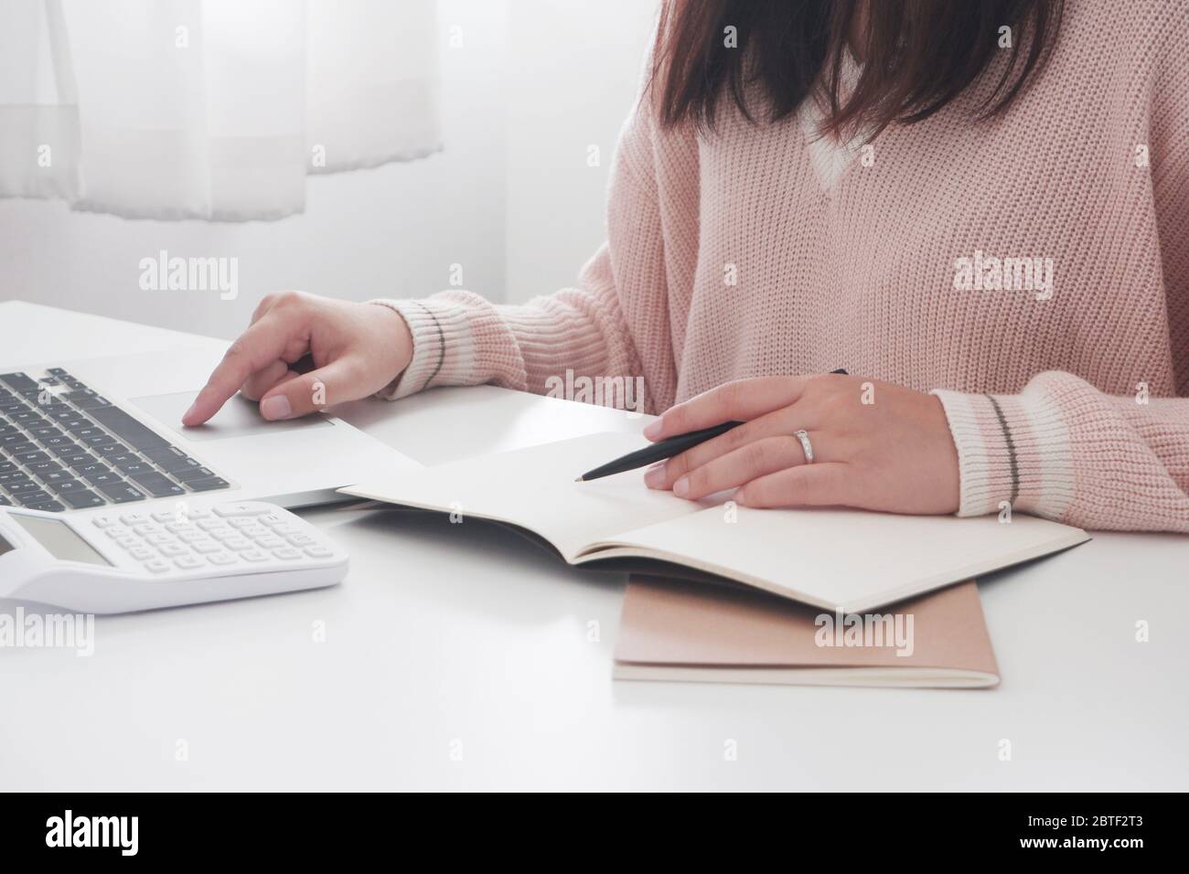 female remotely working, studying online Stock Photo