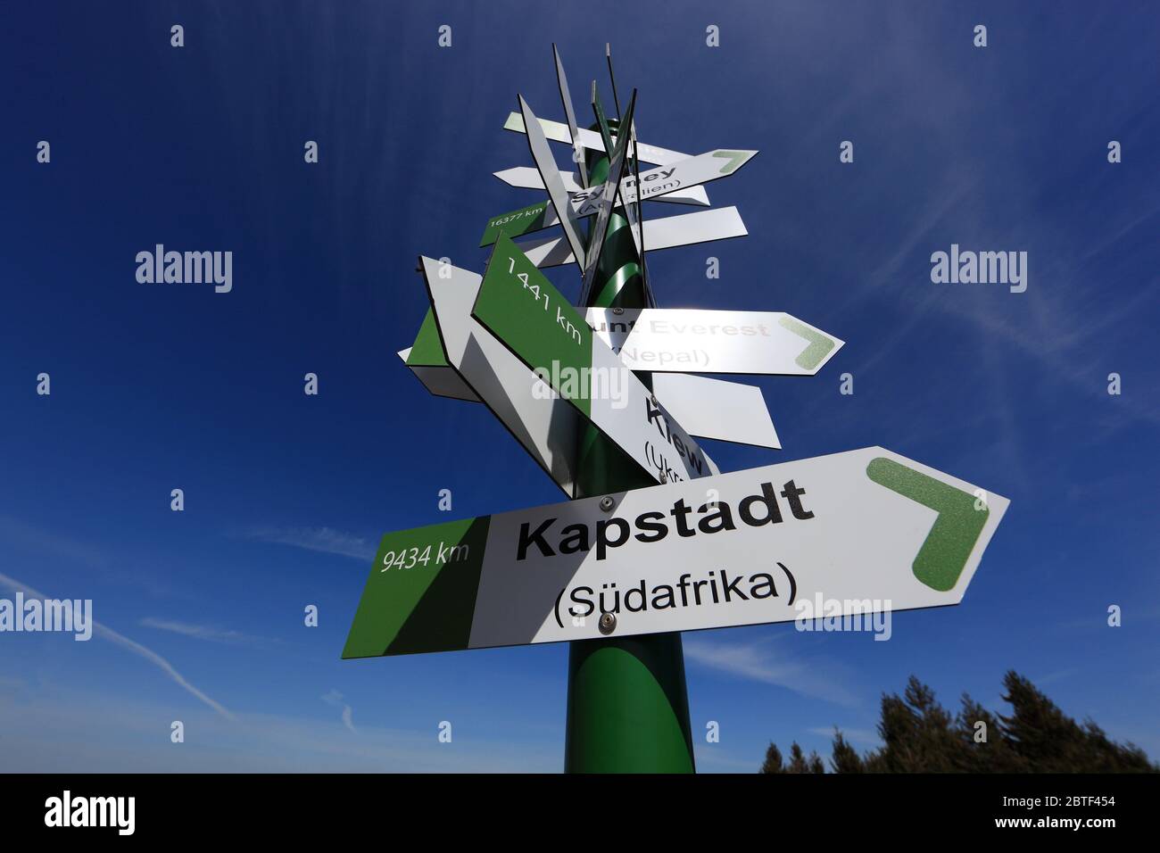 World signposts, observation tower Noah's sailing at the elbow, 813 m. mountain at the Rhon in Schmalkalden-Meiningen, Thuringia, Germany  /  Weltwegw Stock Photo