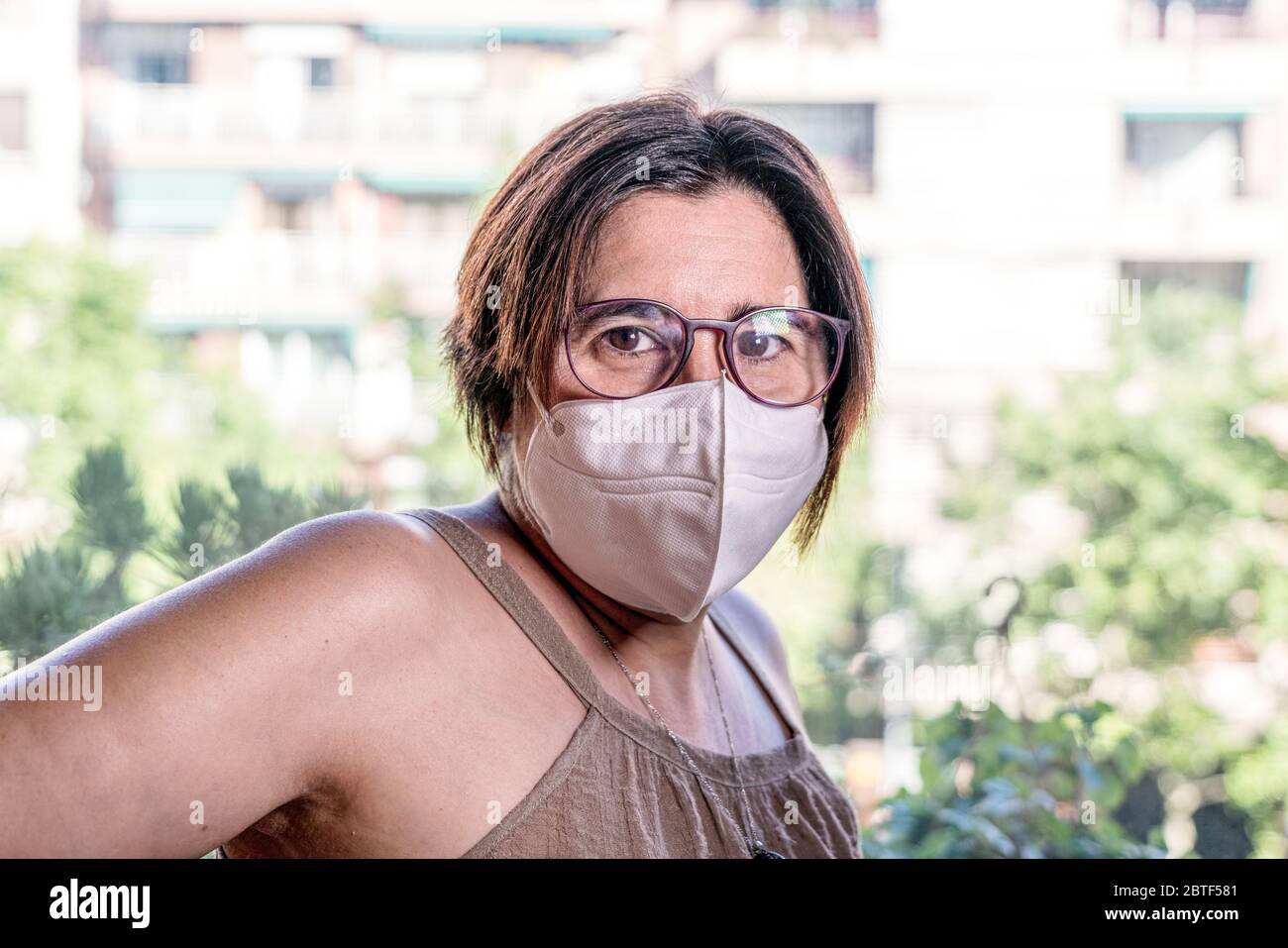 Woman with face mask in corona virus time. Barcelona, Spain. Stock Photo