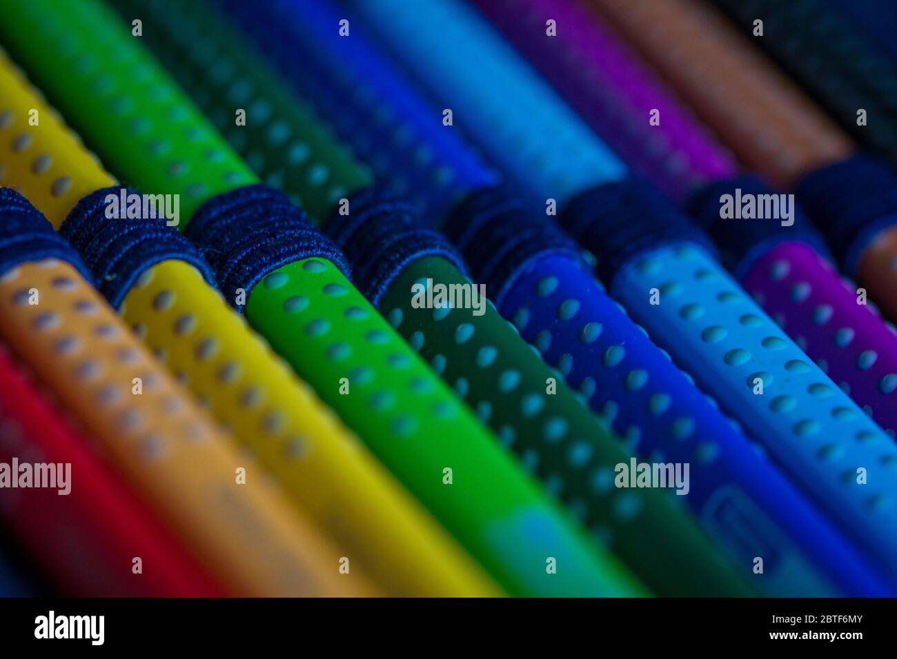 Pencil case with colored crayons Stock Photo