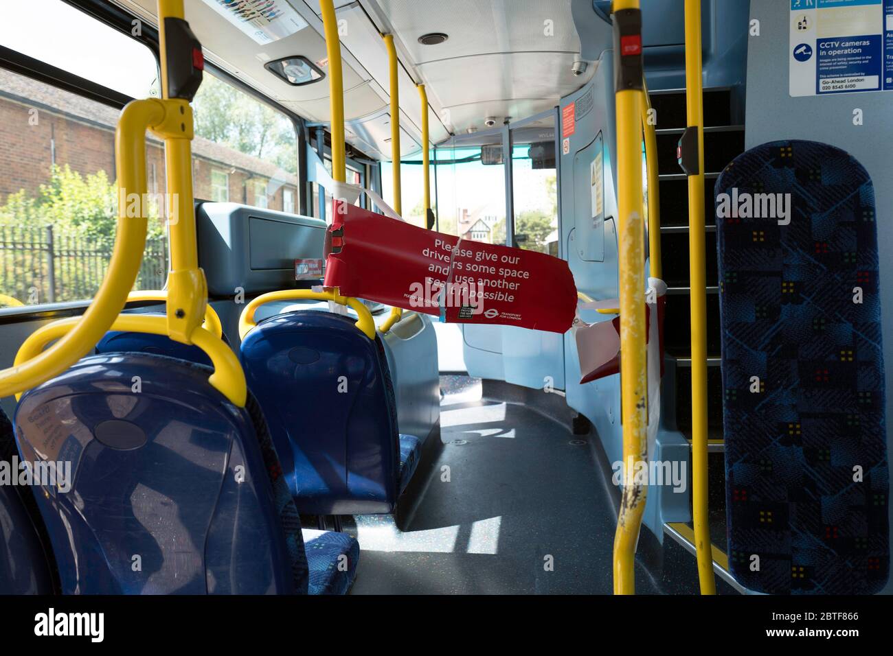 Bus interior with sign telling passengers not to stand close to the driver Stock Photo