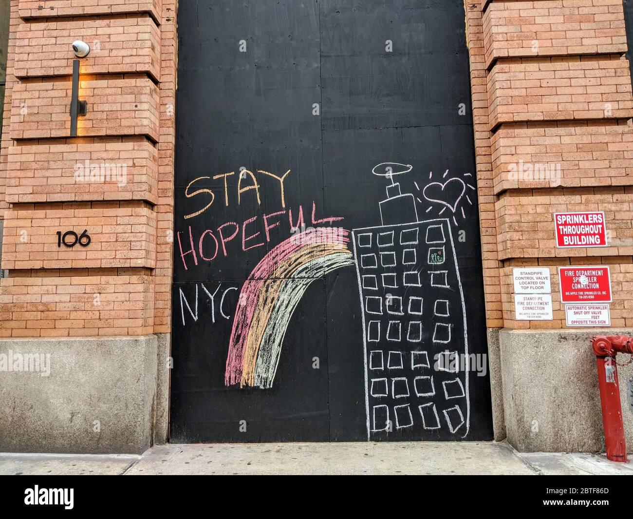Sign in Manhattan urging people to stay positive during the coronavirus pandemic in New York City. Stock Photo