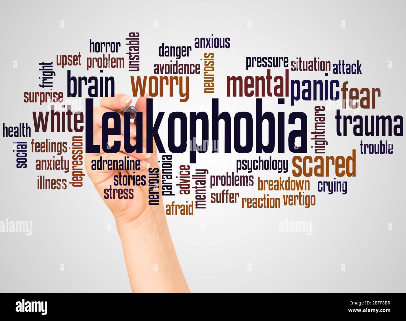 Leukophobia fear of the color white word cloud and hand with marker concept on white background. Stock Photo