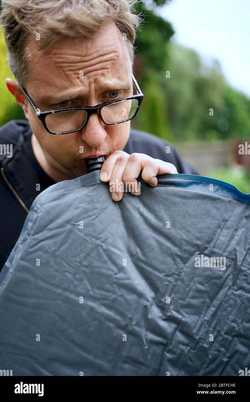 Blowing up inflatable hires stock photography and images Alamy