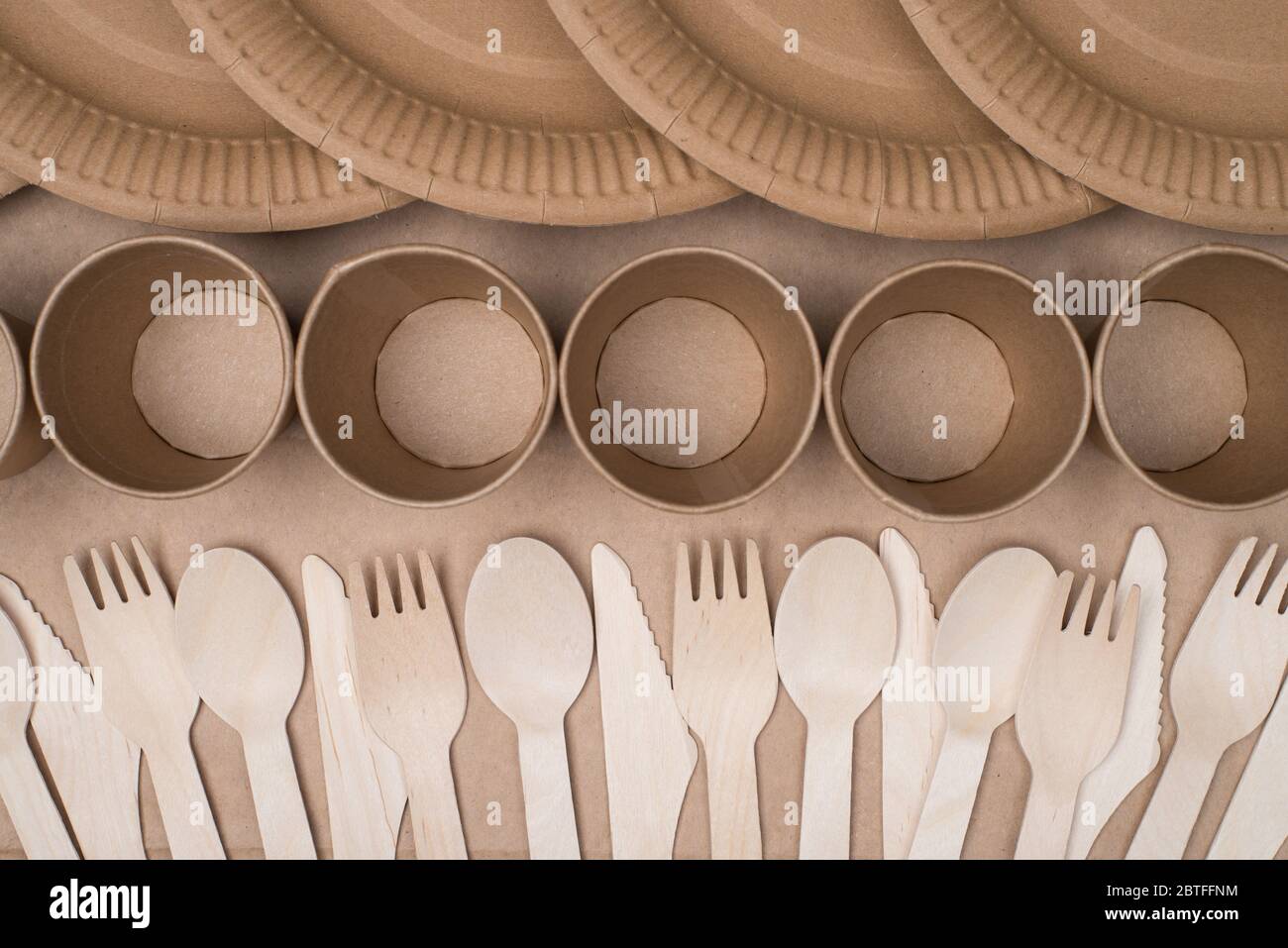 Top above overhead view photo of rows of wooden cutlery, paper cup and ...
