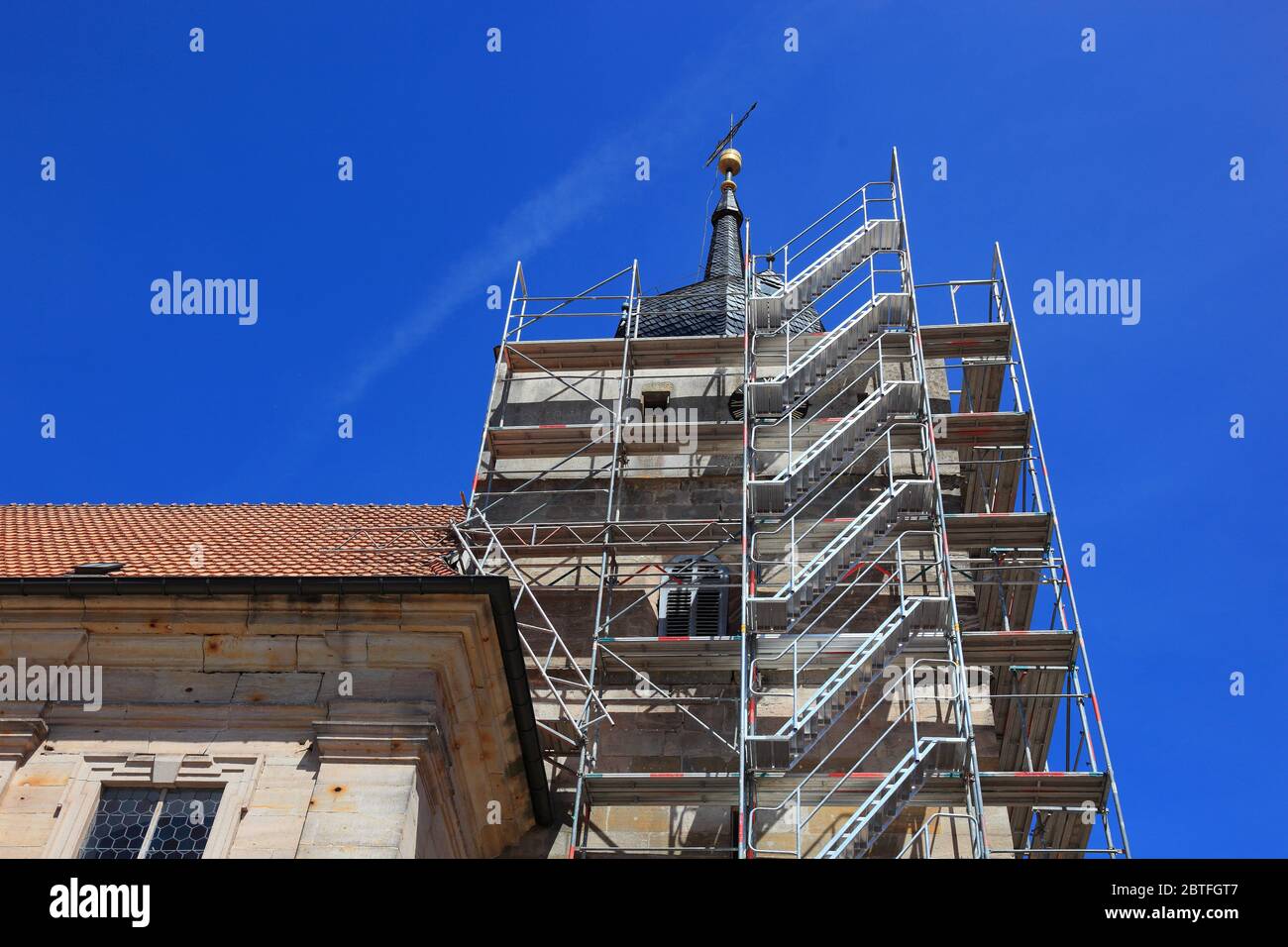 Been modified means bell tower, renovation, Protestant Church of St. Bartholomew, second smallest city in Germany, Ummerstadt in the district of Hildb Stock Photo