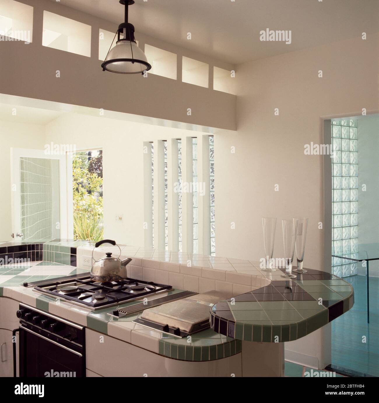 Kettle on hob in eighties kitchen Stock Photo Alamy