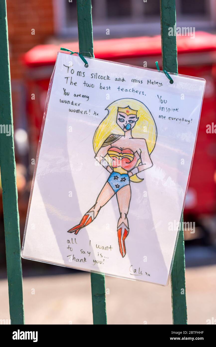 Sign made by children strung on the fence of Westborough School in Westcliff on Sea, Essex, thanking teachers. Thanks to key workers. Kid's messages Stock Photo