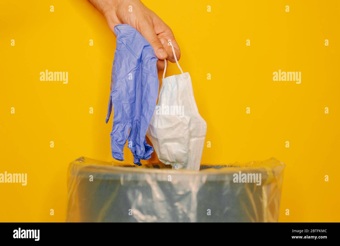 Hand throwing surgical mask and glove, protective mask or mouthpiece ...