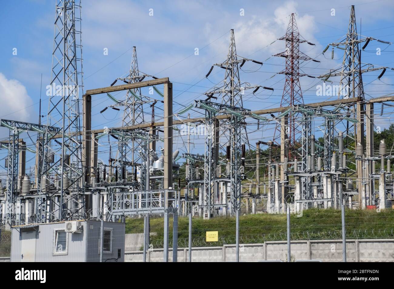 a Power substation equipment, transformers and wire poles. Stock Photo