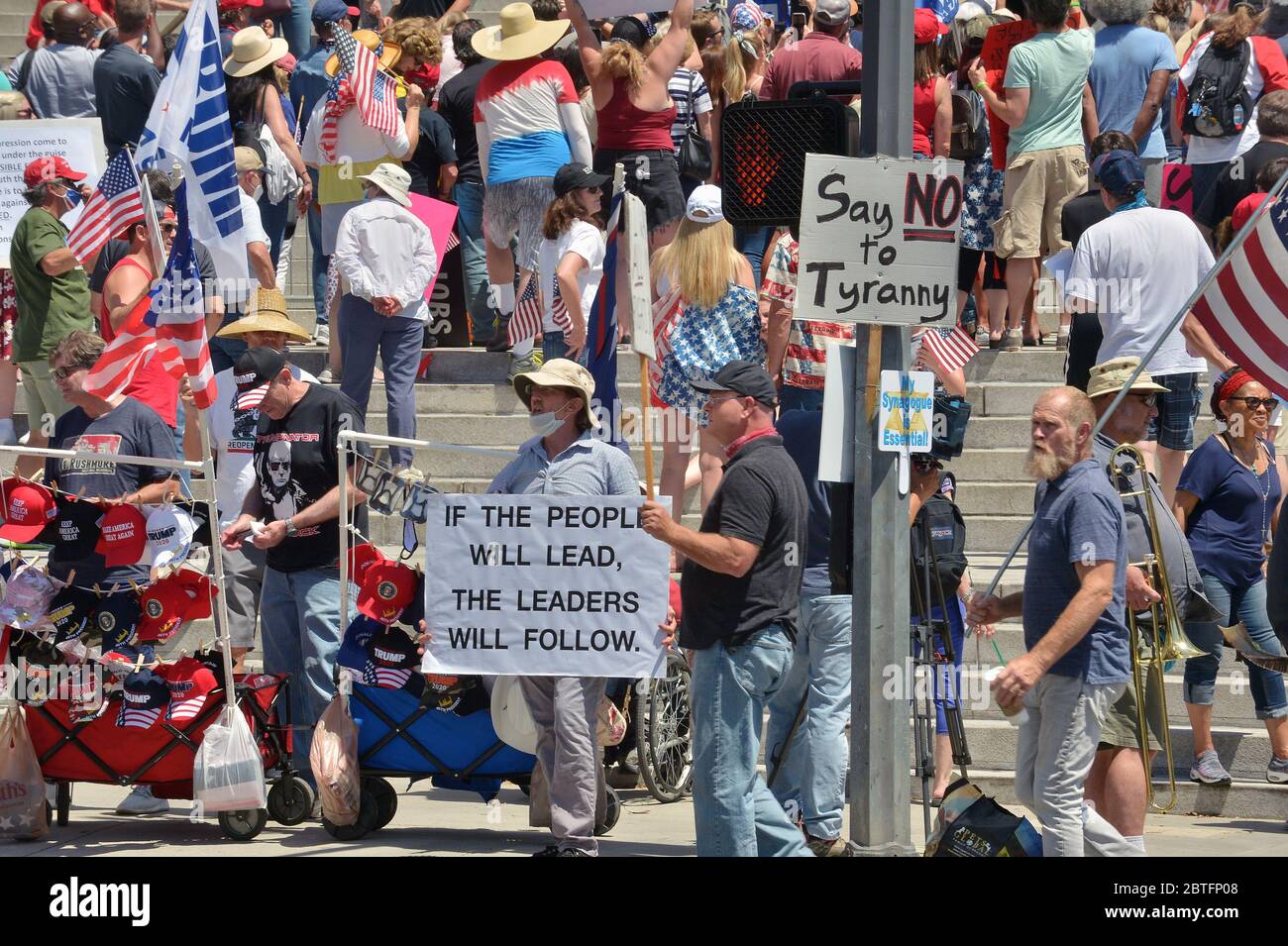 Los Angeles, United States. 25th May, 2020. Hundreds of President Trump supporters hold a 'Freedom Rally' calling to 'open California' on the steps of City Hall in Los Angeles on Sunday, May 24, 2020. Officials have said the lockdowns are needed to reduce the spread of the coronavirus. Photo by Jim Ruymen/UPI Credit: UPI/Alamy Live News Stock Photo