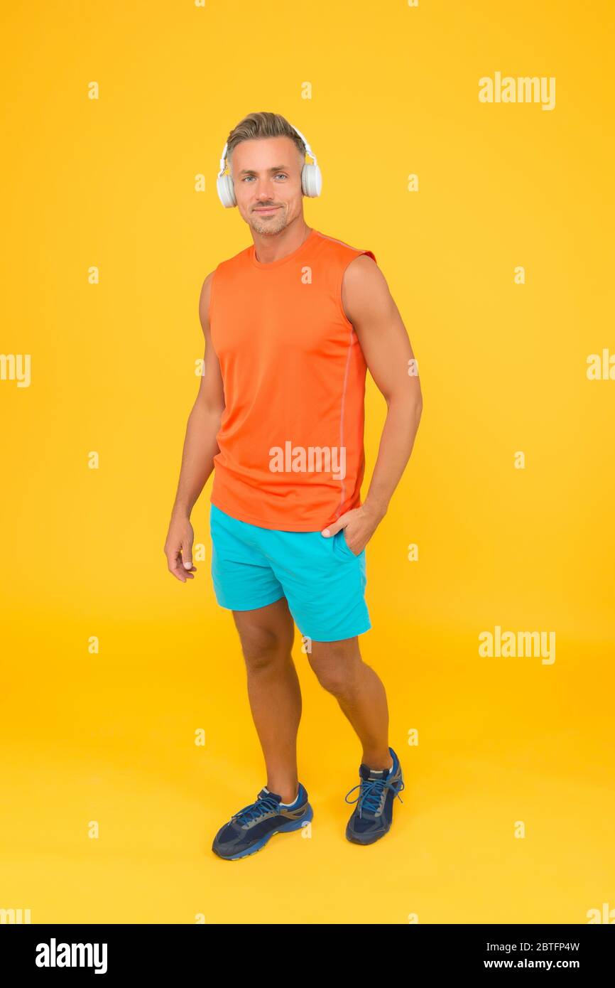 https://c8.alamy.com/comp/2BTFP4W/this-is-my-therapy-modern-guy-train-with-music-sportsman-wear-gym-clothes-modern-technology-for-sport-workout-modern-life-fitness-trend-active-lifestyle-get-fit-physique-with-modern-approach-2BTFP4W.jpg