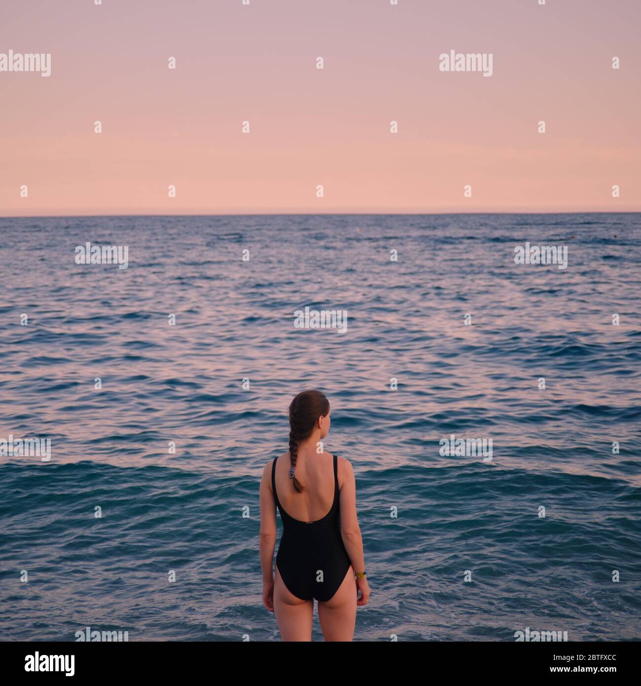 Black swimsuit hi-res stock photography and images - Alamy