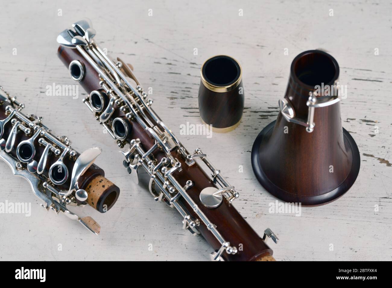 Parts of a music instrument on white wooden floor Stock Photo Alamy