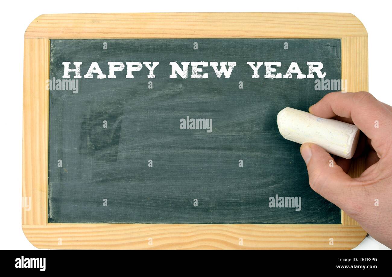 Hand writing Happy New Year chalkboard with copy space Stock Photo