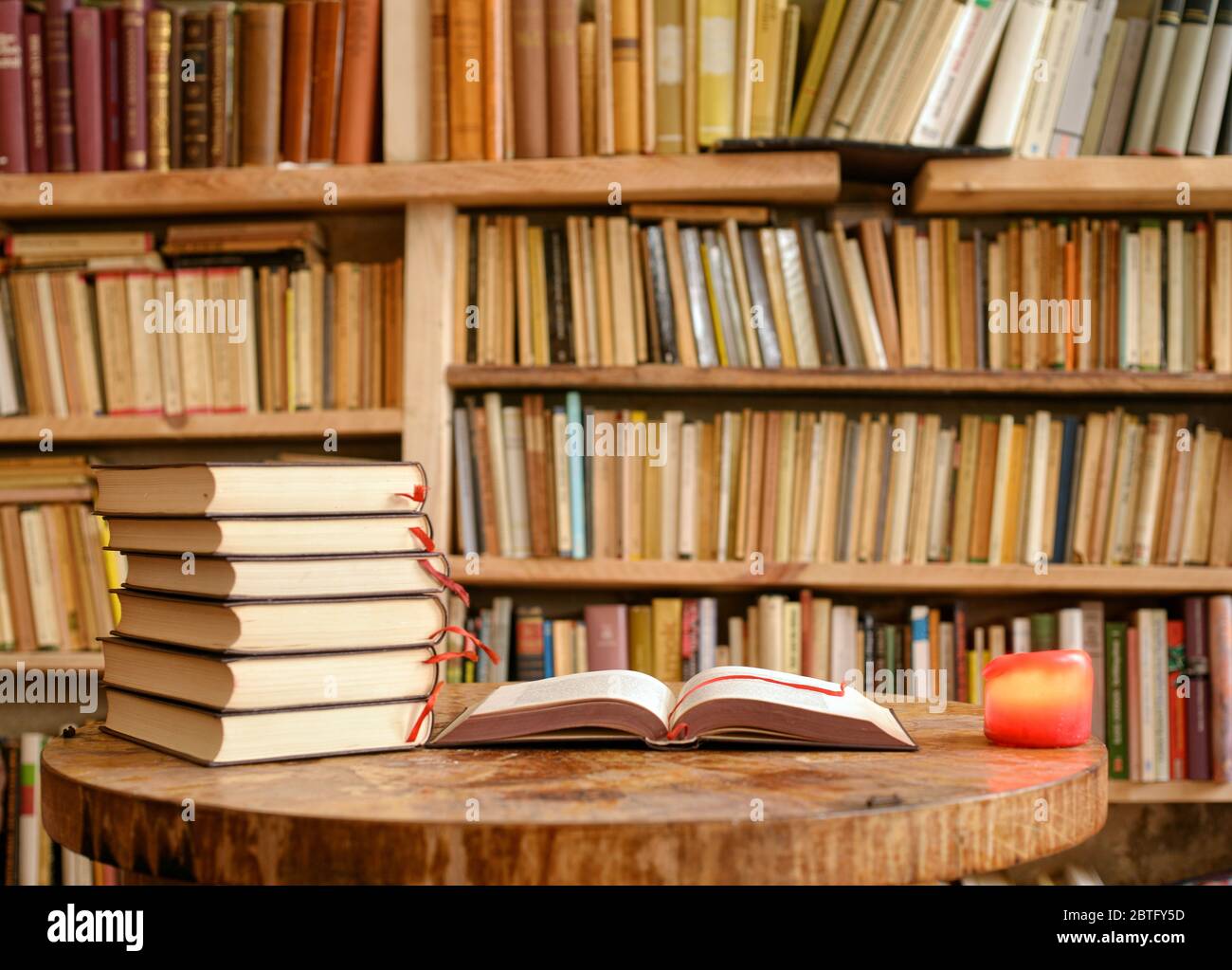 vintage books on table in a library Stock Photo Alamy