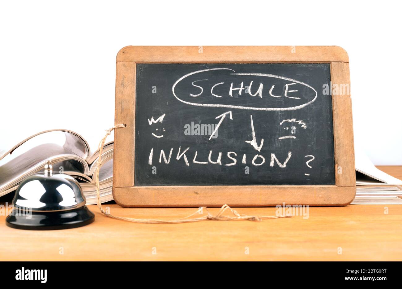 Inclusion school concept with bell Stock Photo