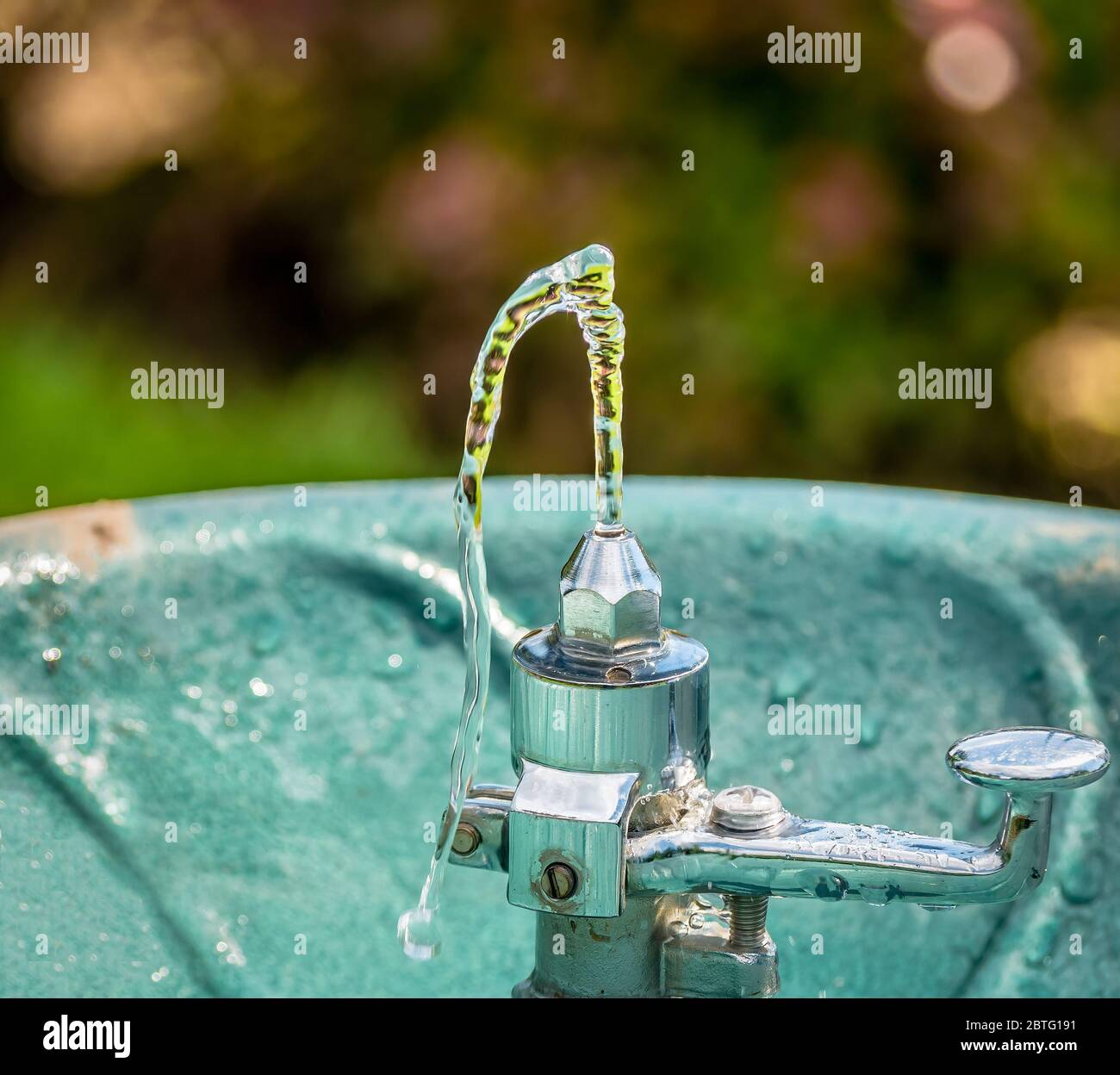 Outdoor water tap or foutain. Drinking water in the park on a ...
