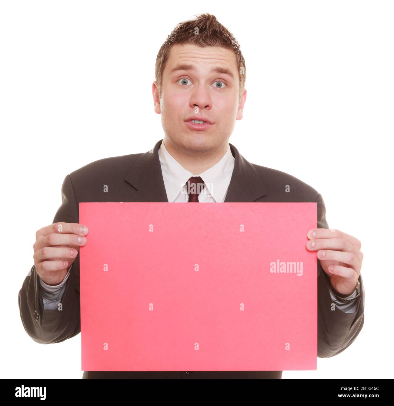 Nerdy business man or goofy student guy holding sign red blank copy