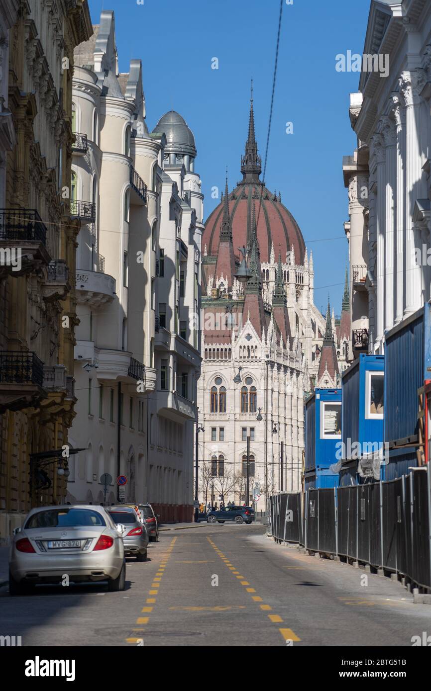 Feb 8, 2020 - Budapest, Hungary: Akademia street view of Hungarian Parliament dome Stock Photo