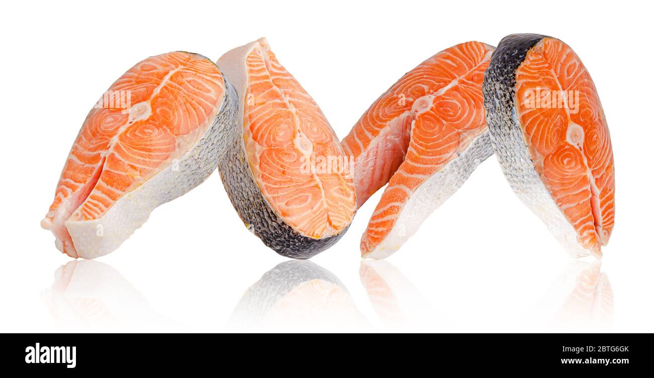 Raw steaks of salmon fish isolated on white Stock Photo - Alamy