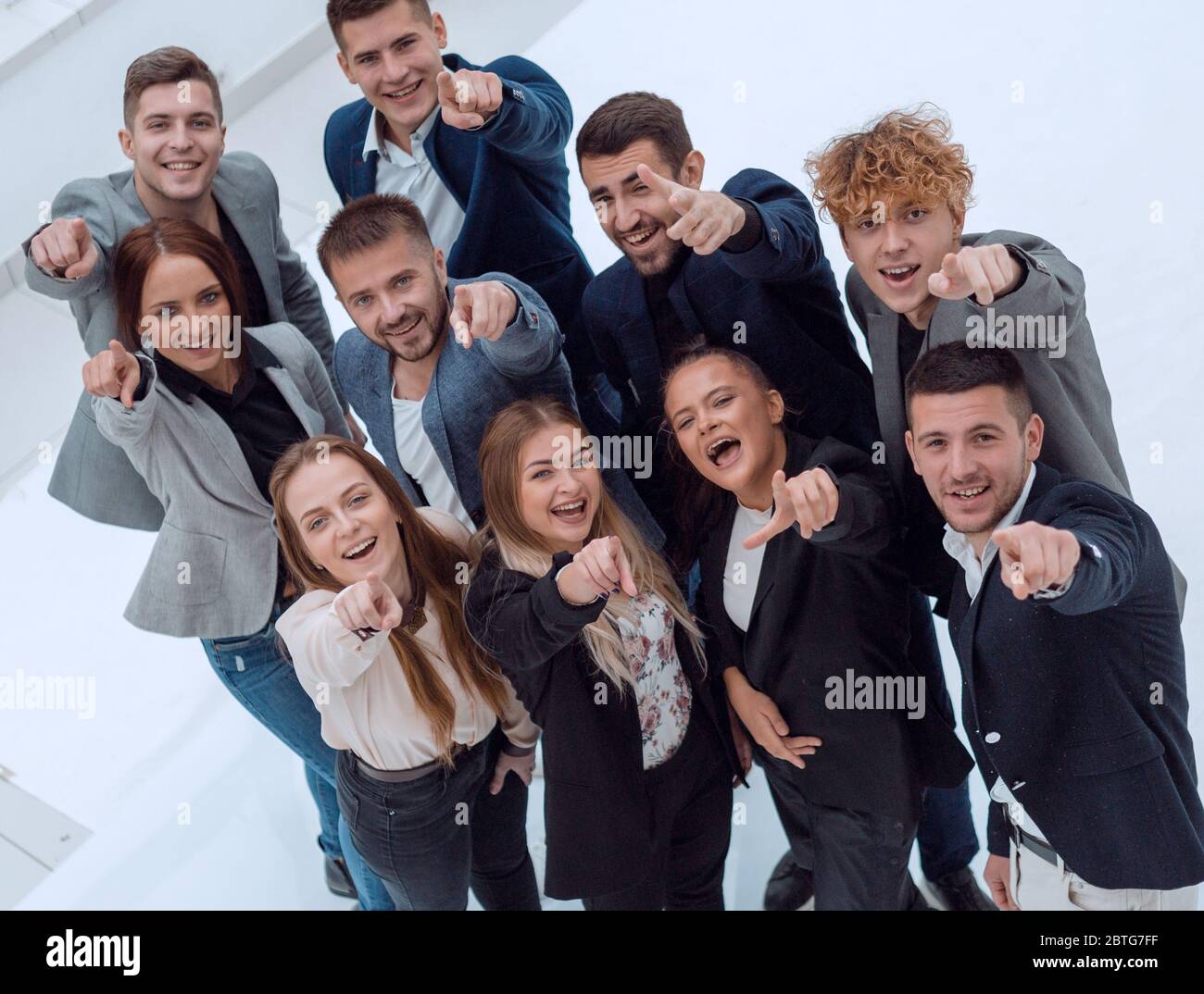 top view. happy business team standing in the new office Stock Photo ...