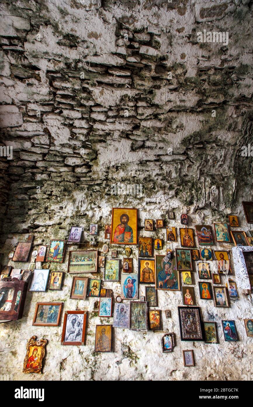 Church in a cave. It is a Greek Orthodox christian church called Analipsi (Ascension) of Jesus Christ, in Hymettus mount, Athens, Greece. Stock Photo