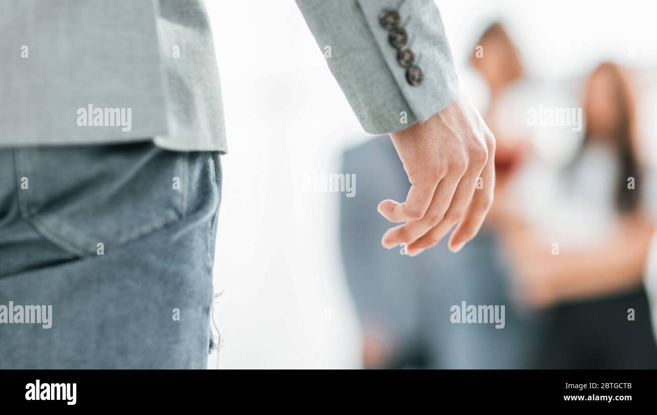 close up. speaker standing in the conference room. Stock Photo